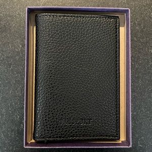 Neiman Marcus faux snakeskin passport holder. NWOT. Perfect condition.